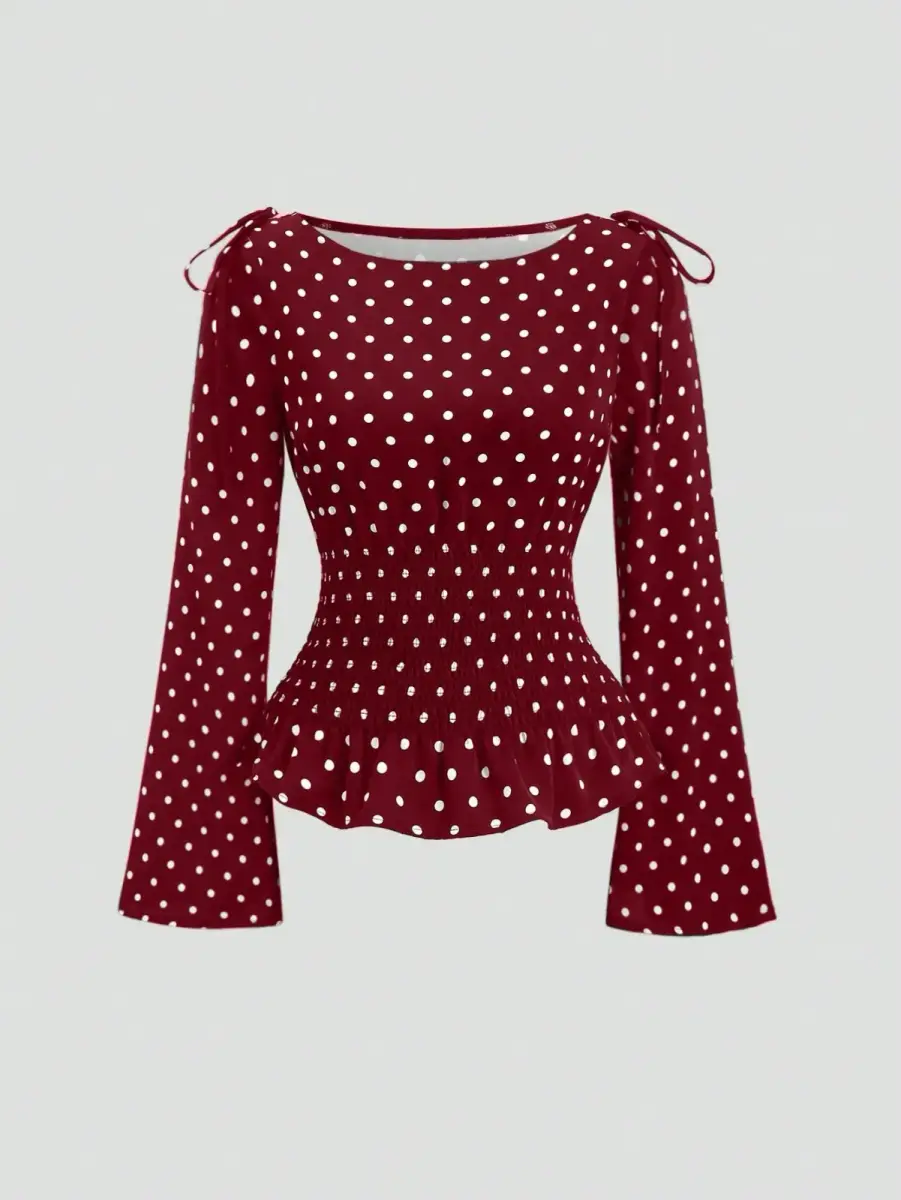 blouse à pois avec taille smockée et nœuds aux épaules