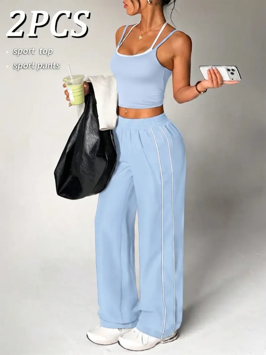 Ensemble de sport 2 pièces bleu marine débardeur court et pantalon large à liserés